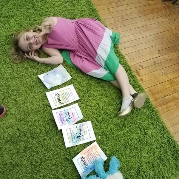 Memory-verse cards laid out on the turf